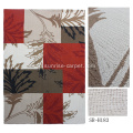 Hand hooked carpet dengan desain busana